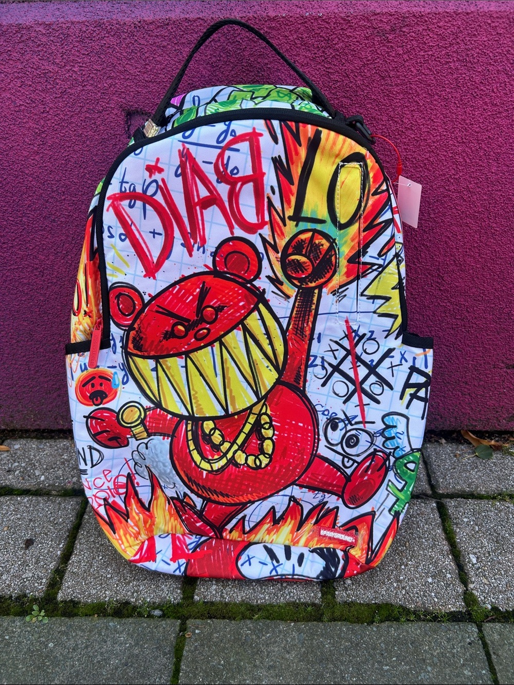 Sprayground Red, Yellow & Green Graffiti Backpack